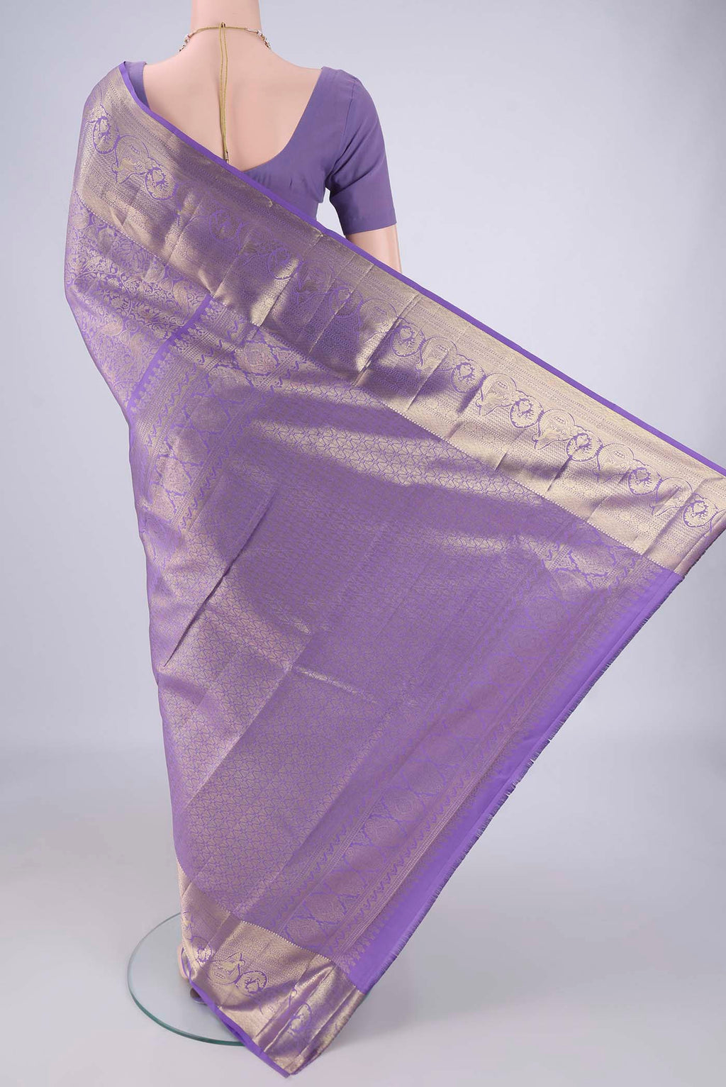 Flat view of Lavender Dual Tone Kanchipuram Tissue Silk Saree with Zari Brocade on the body and Zari Border. 