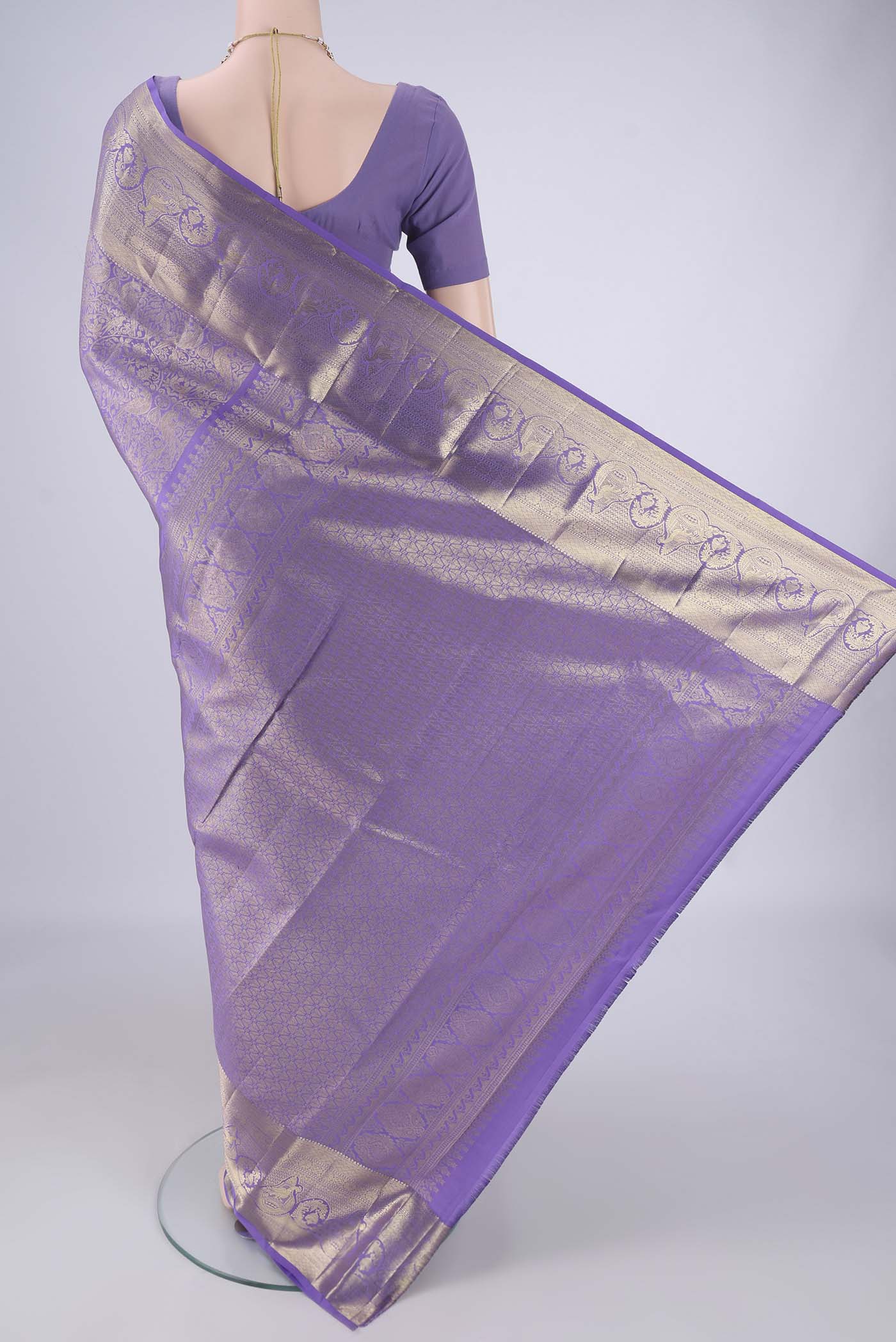 Flat view of Lavender Dual Tone Kanchipuram Tissue Silk Saree with Zari Brocade on the body and Zari Border. 