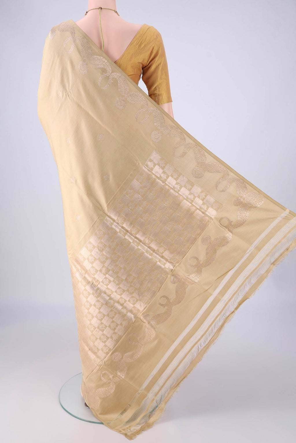 Flat view of Dark Beige Banarasi Silk Saree with Zari Butta on the body and Zari Border. 
