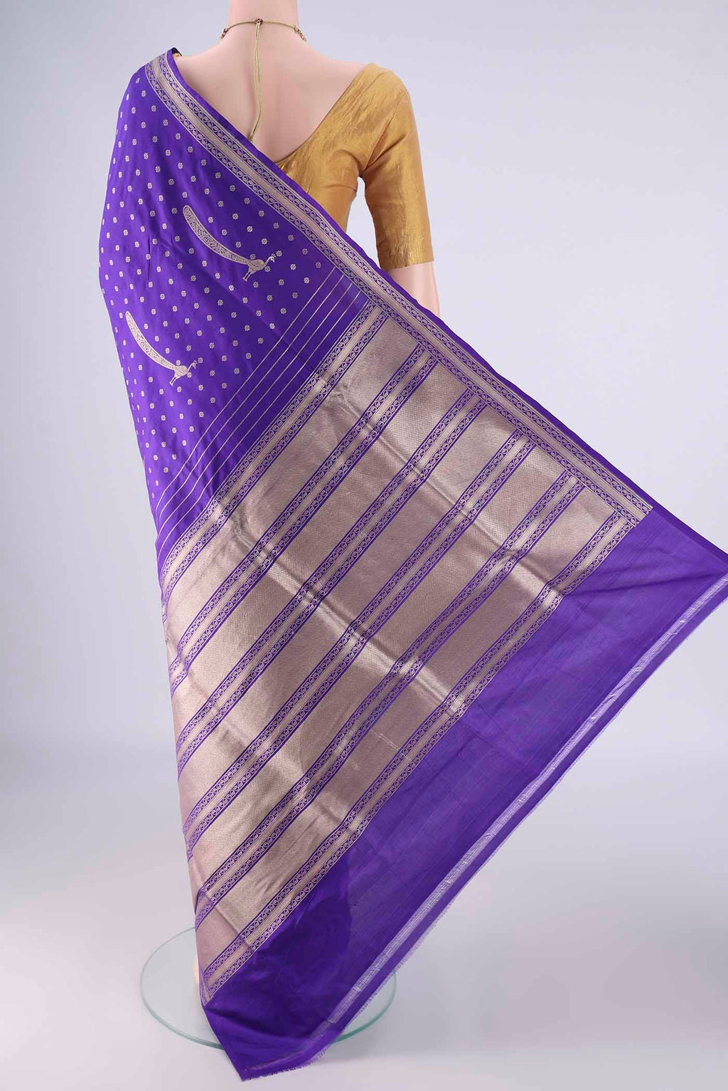 Flat view of Royal Blue Banarasi Silk Saree with Zari Butta on the body and Zari Border. 