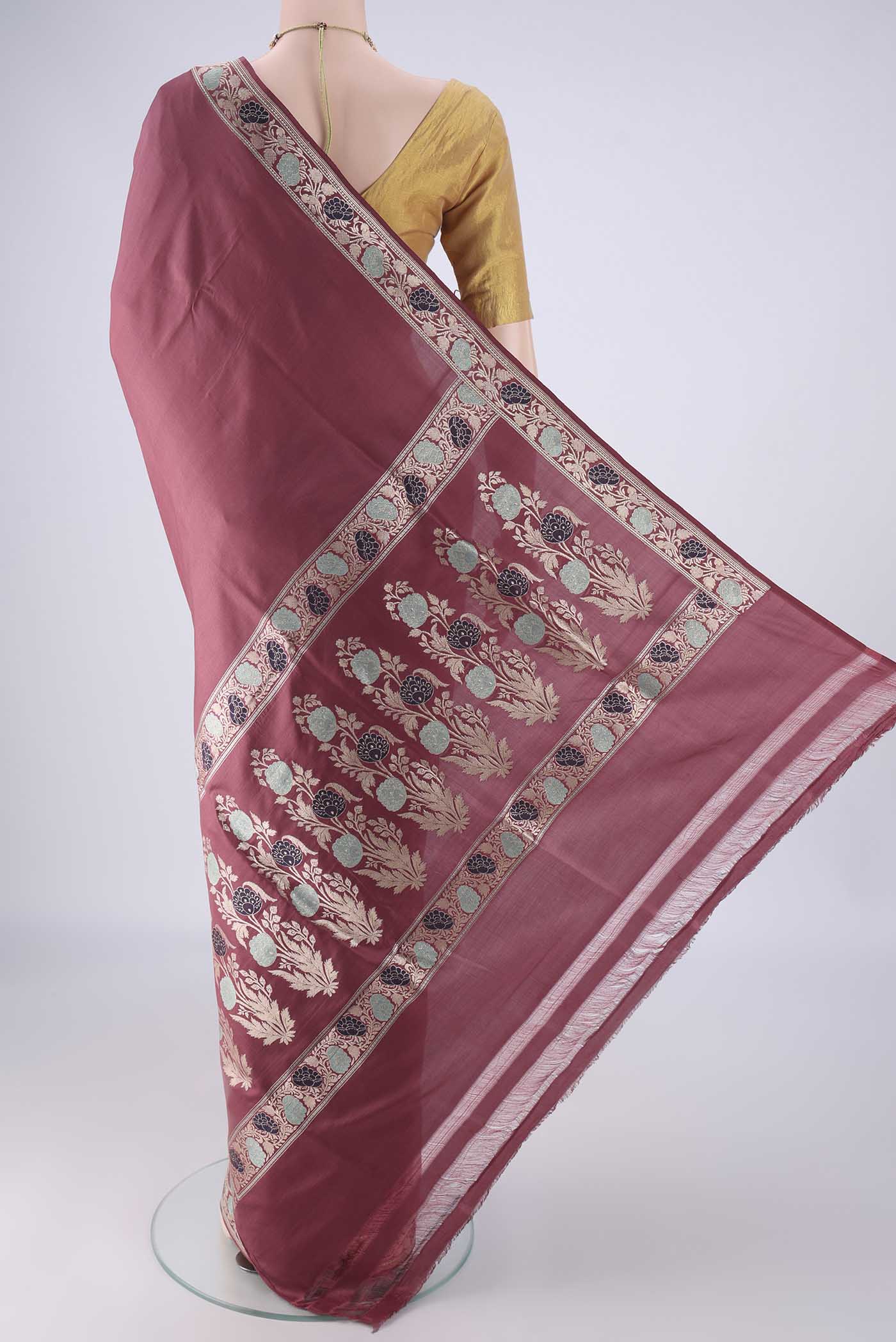 Flat view of Mauve Banarasi Silk Saree with Plain Body and Meenakari Border. 