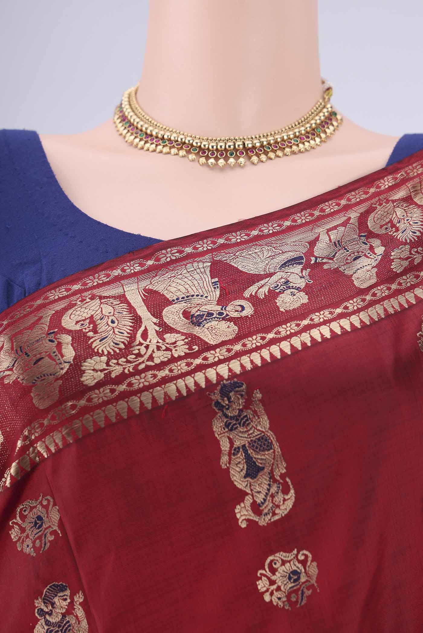 Border image of Maroon Baluchari Silk Saree with Zari And Thread Butta on the body and Zari And Thread Border. 
