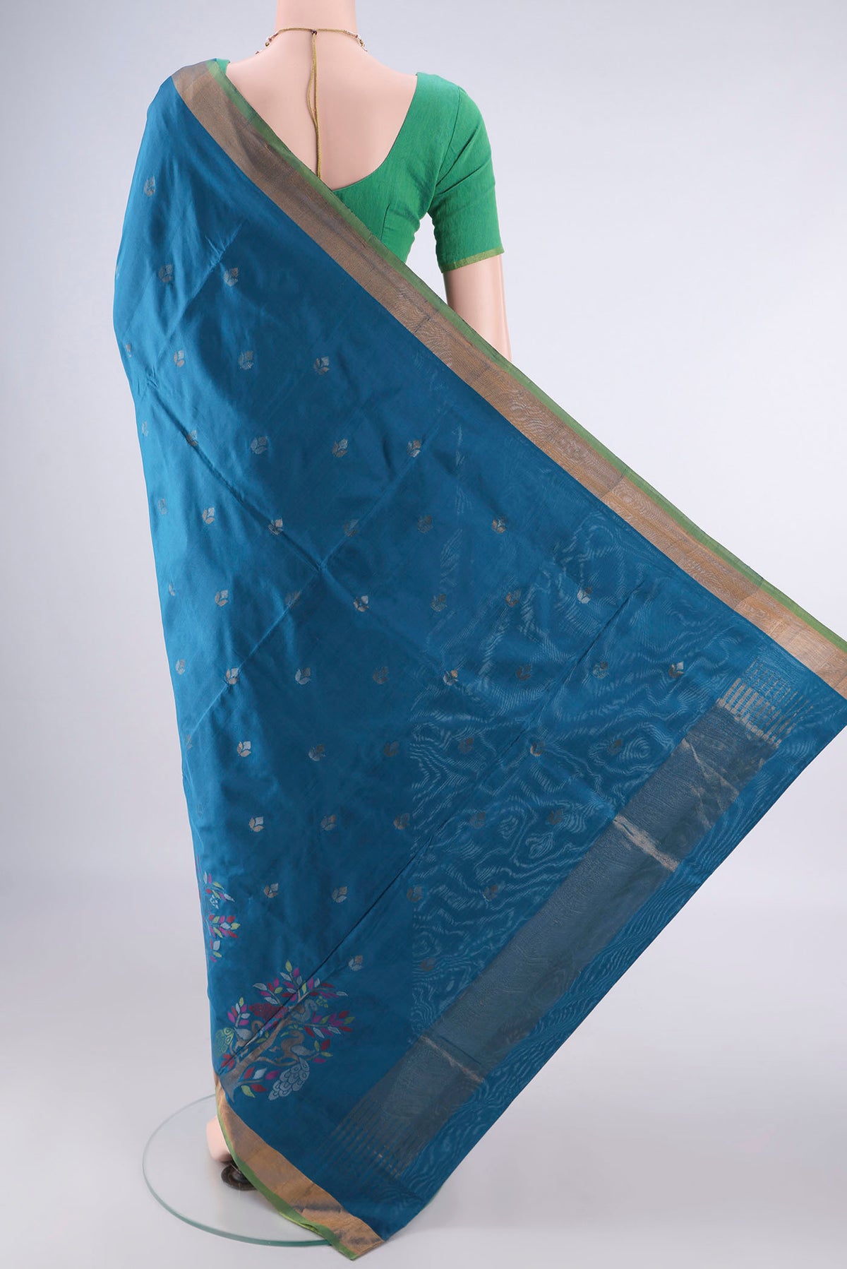 Flat view of Pure Silk Blue Uppada Saree with Zari Butta on the body and Zari Border. 