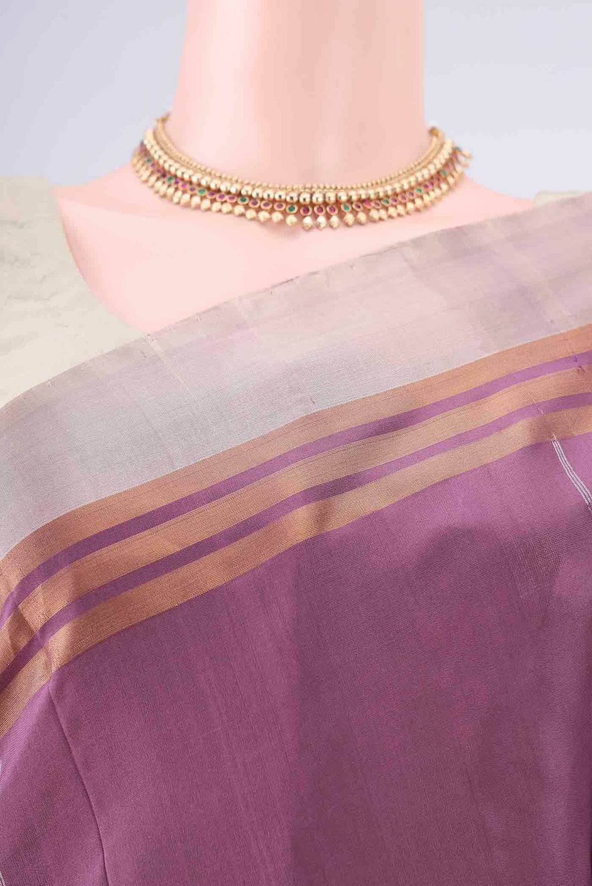 Border image of Pure Silk Mauve Uppada Saree with Zari Butta on the body and Zari Border. 