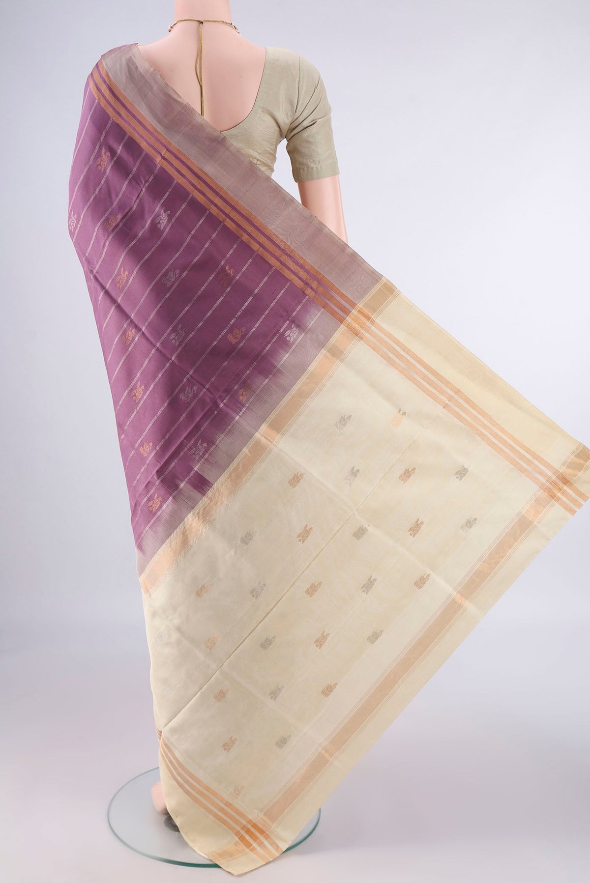 Flat view of Pure Silk Mauve Uppada Saree with Zari Butta on the body and Zari Border. 