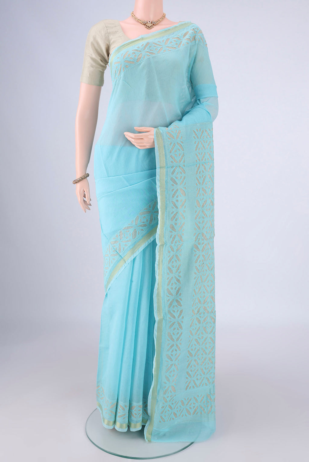 Sky Blue Chanderi Silk Cotton Saree with Plain Body and Fancy Border.  displayed on a mannequin