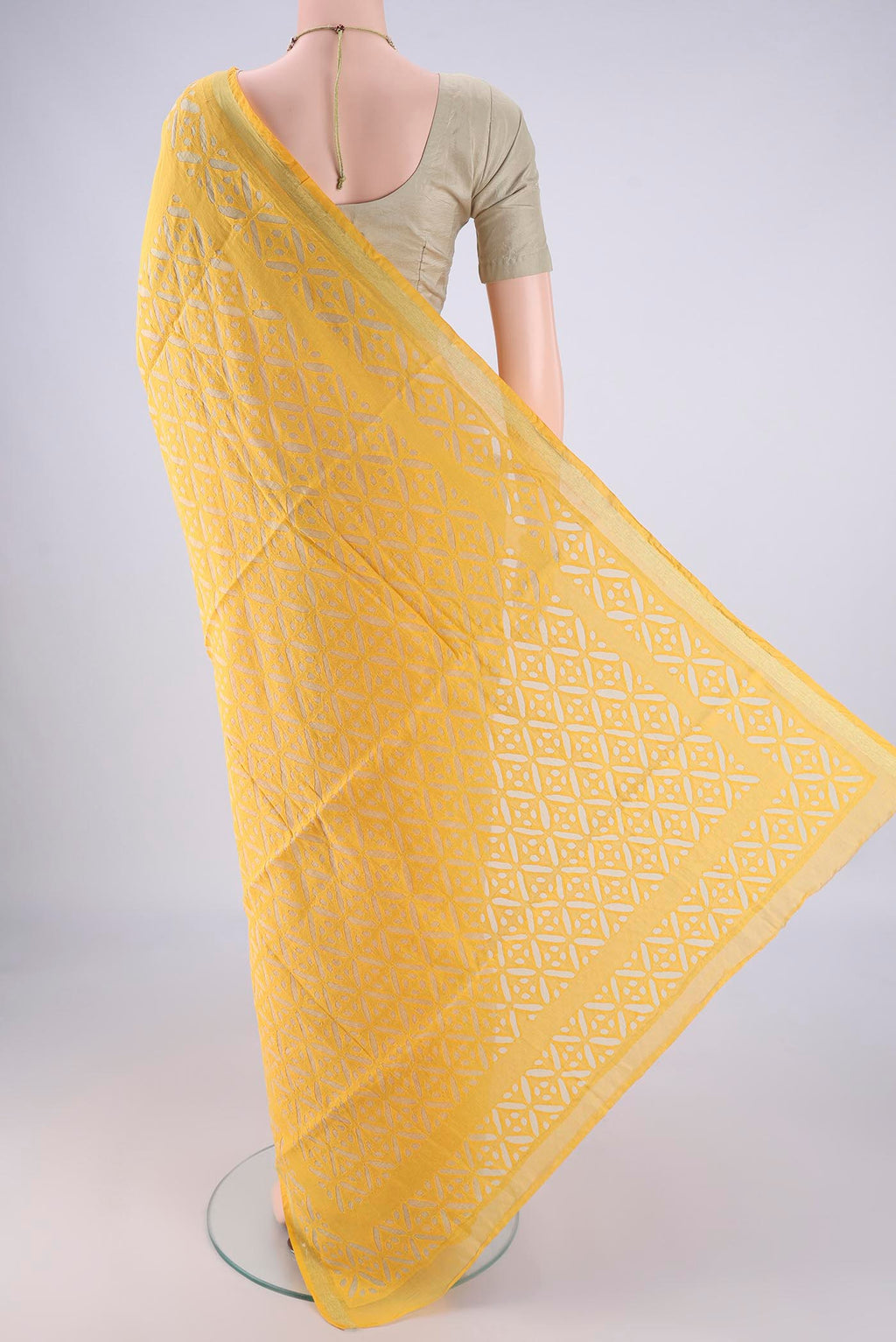 Flat view of Yellow Chanderi Silk Cotton Saree with Plain Body and Fancy Border. 