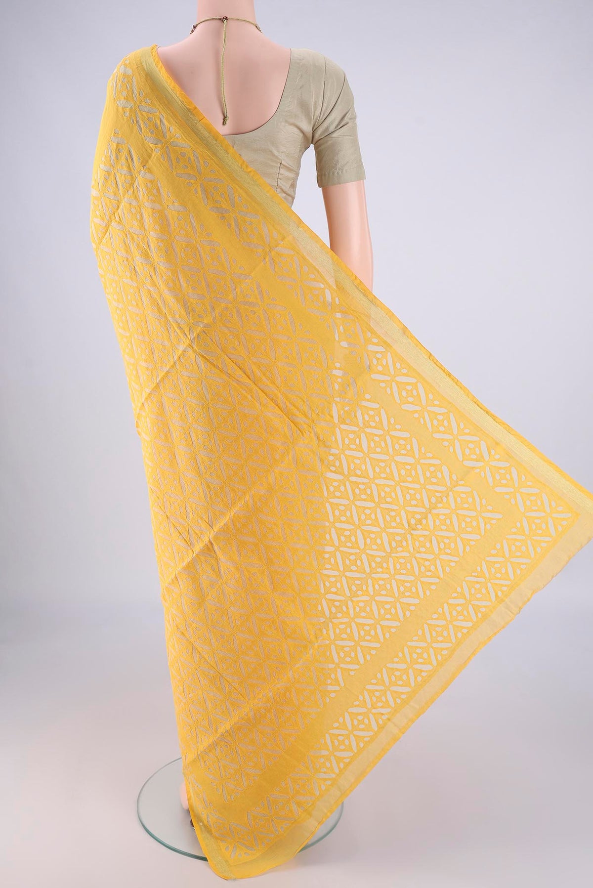 Flat view of Yellow Chanderi Silk Cotton Saree with Plain Body and Fancy Border. 