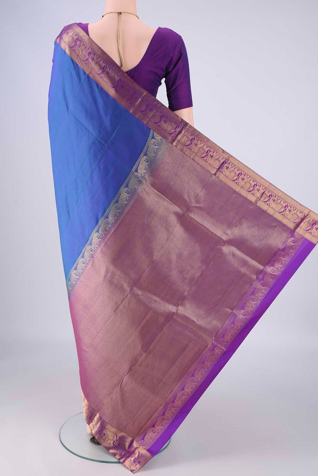 Flat view of Royal Blue Kanjivaram Silk Saree with Plain Body and Zari Border. 