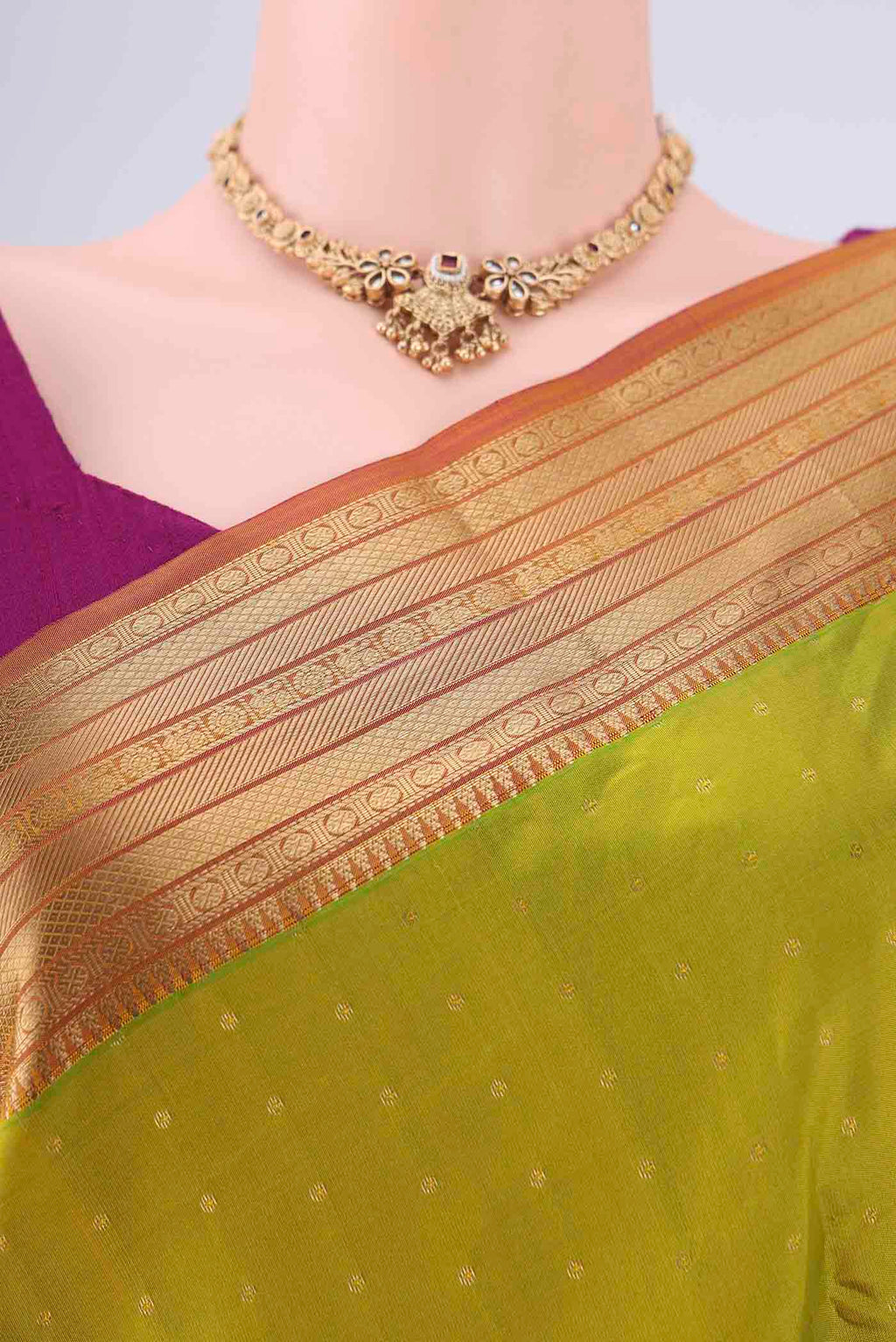 Border image of Light Green Kanchipuram Silk Saree with Zari Butta on the body and Zari Border. 