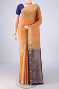 Sandal Kanchipuram Silk Saree with Zari Butta on the body and Zari Border.  displayed on a mannequin