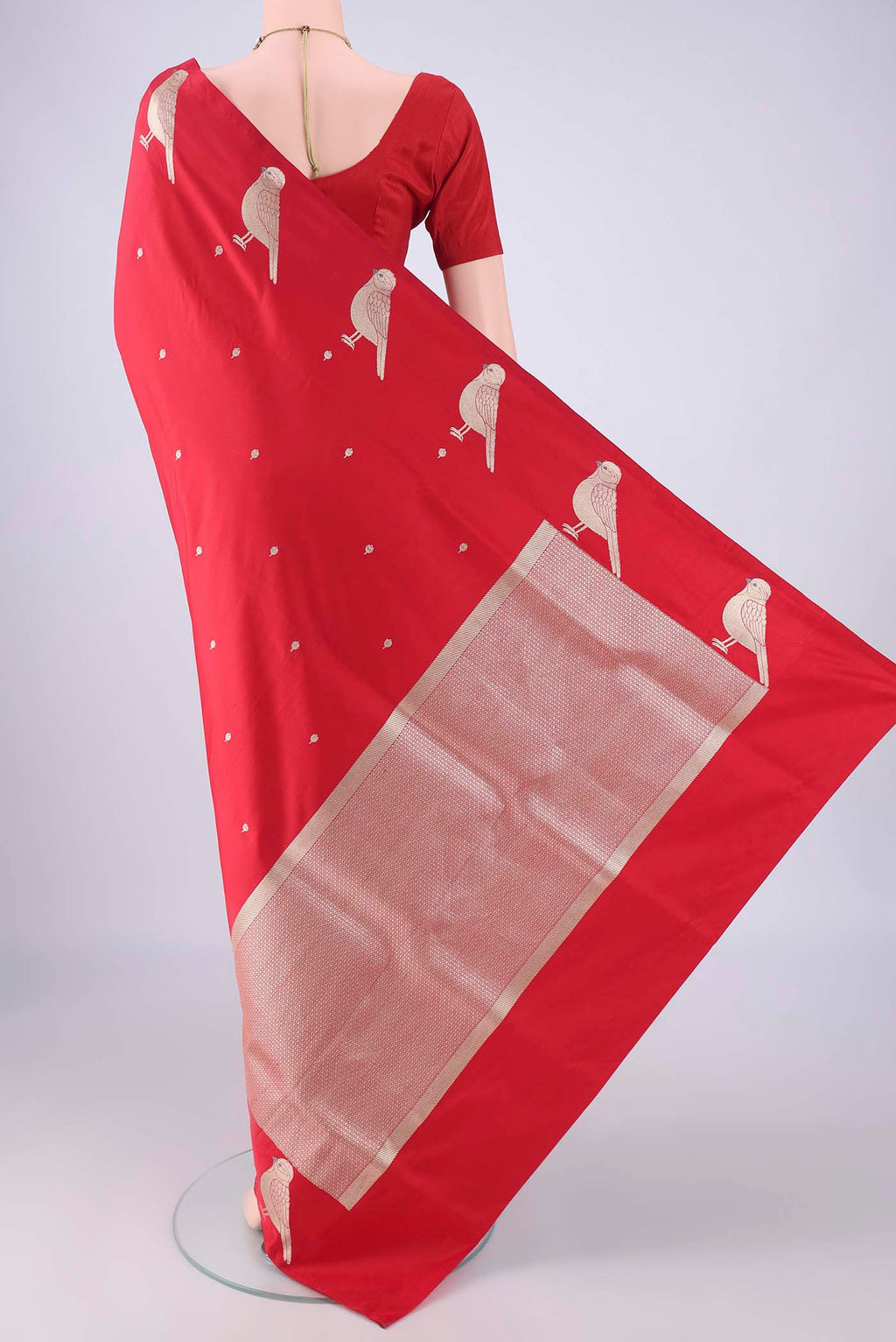 Flat view of Red Banarasi Silk Saree with Zari Butta on the body and Zari Border. 