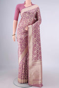 Mauve Banarasi Saree with Zari Brocade on the body and Zari Border.  displayed on a mannequin