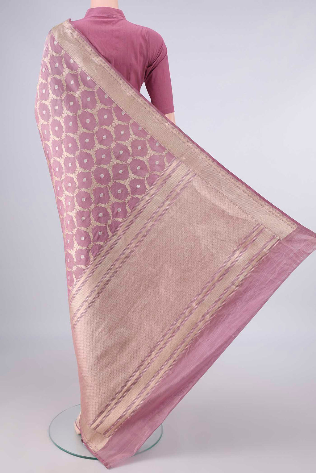 Flat view of Mauve Banarasi Saree with Zari Brocade on the body and Zari Border. 
