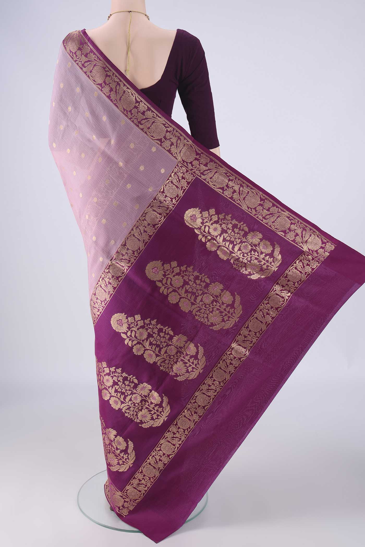 Flat view of Rose Gold Banarasi Silk Saree with Zari Butta on the body and Zari Border. 