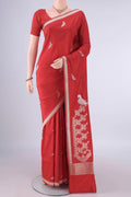 Pure Silk Red Banarasi Saree with Zari Butta on the body and Zari Border.  displayed on a mannequin
