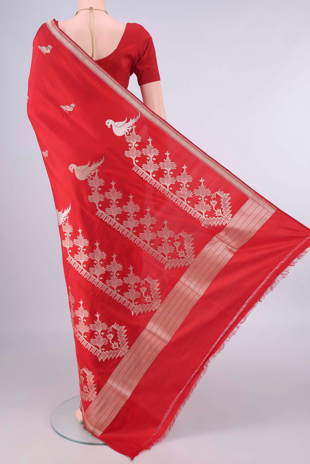 Flat view of Pure Silk Red Banarasi Saree with Zari Butta on the body and Zari Border. 
