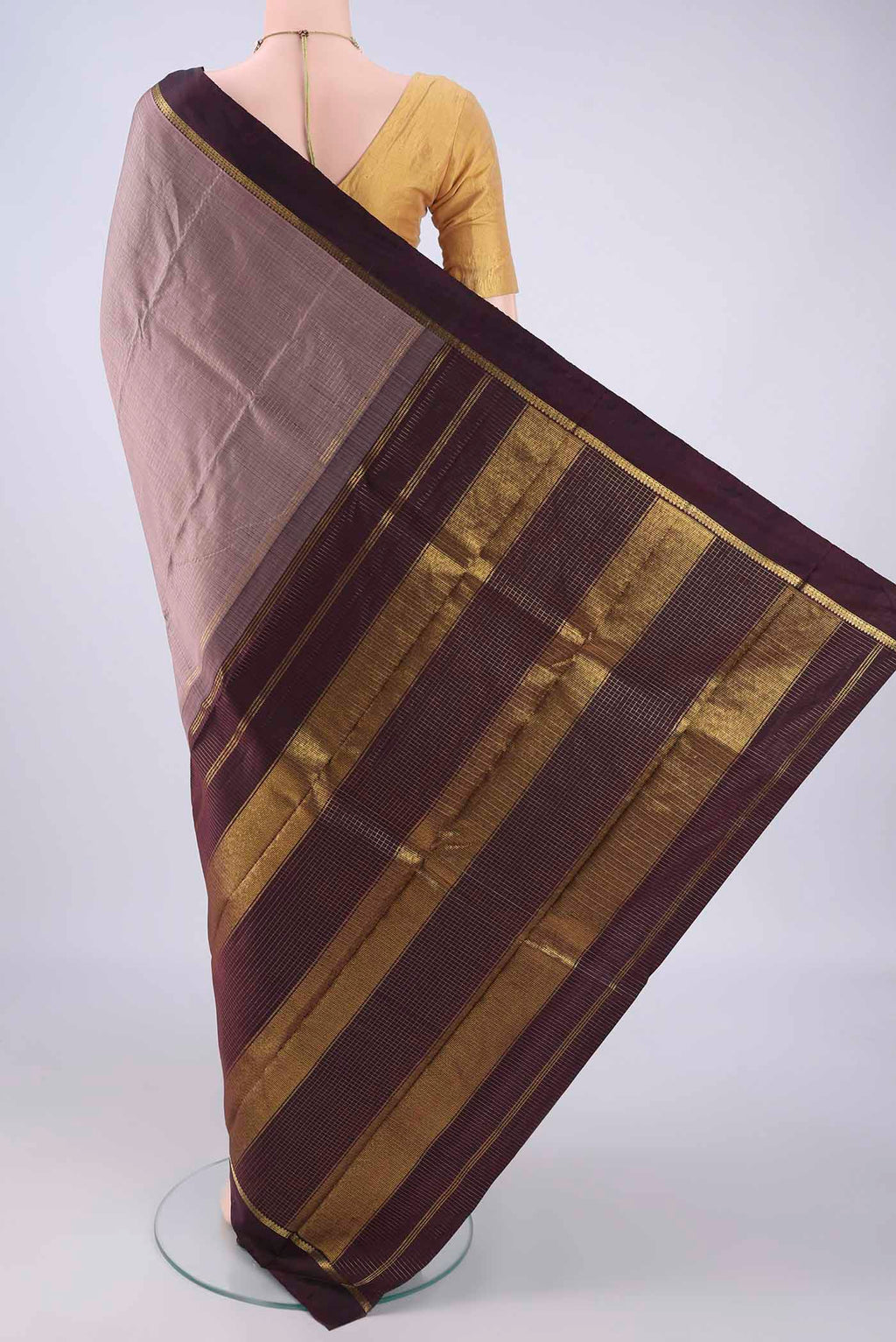 Flat view of Dark Mauve Kanjivaram Silk Saree with Checked design on the body and Zari Border. 