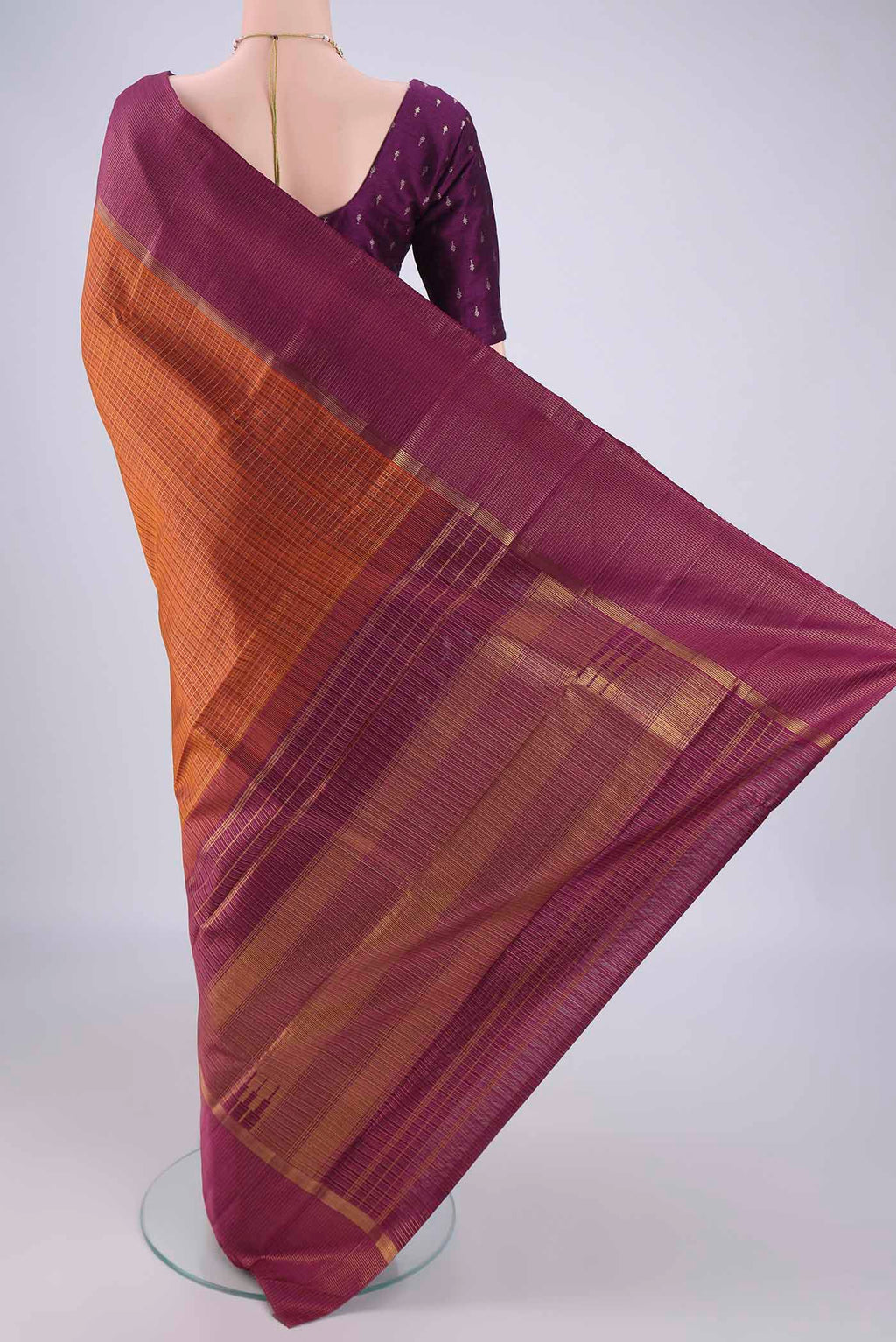 Flat view of Bottle Green Kanjivaram Silk Saree with Zari Brocade on the body and Checks Border. 