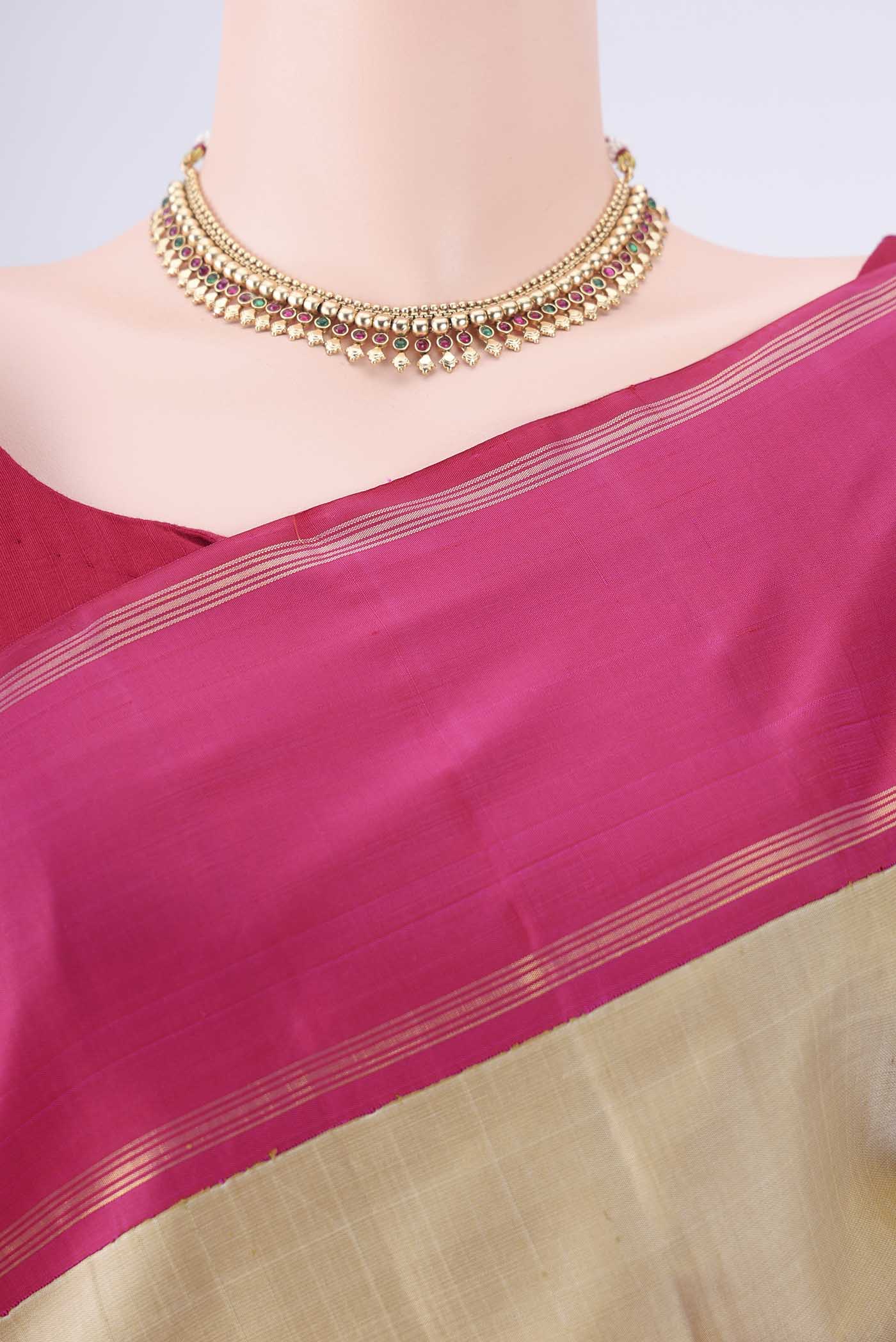 Border image of Beige Kanjivaram Silk Saree with Plain Body and Thin Zari Line. 