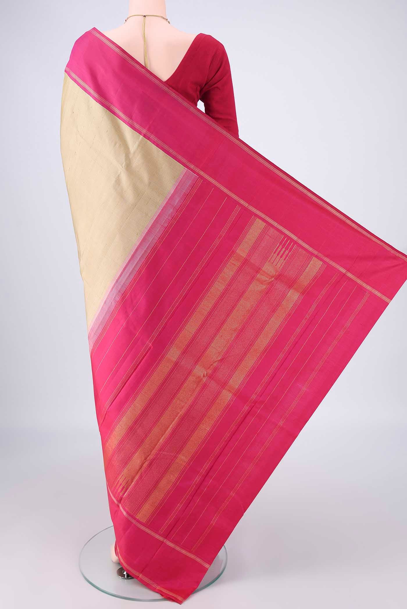 Flat view of Beige Kanjivaram Silk Saree with Plain Body and Thin Zari Line. 