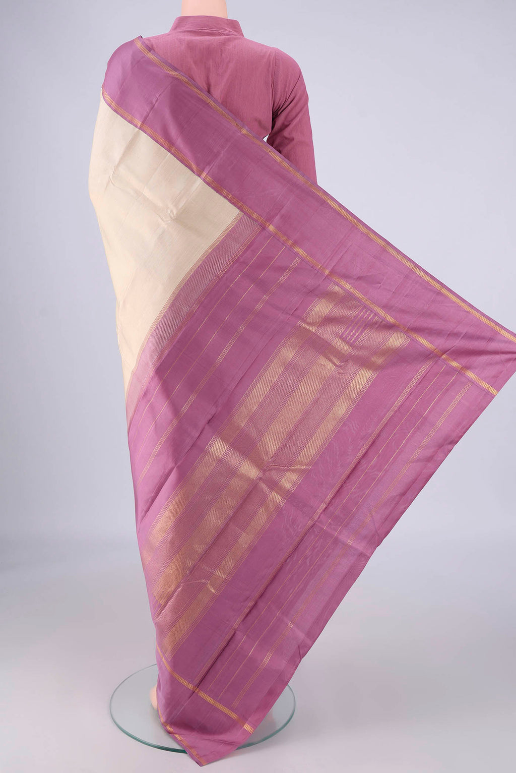 Flat view of Cream Kanjivaram Silk Saree with Plain Body and Plain Border. 