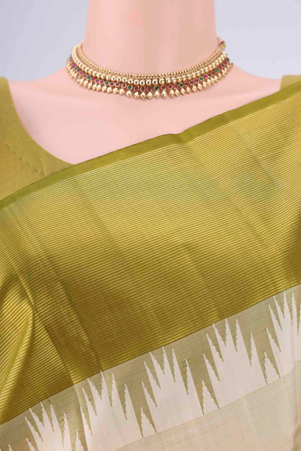 Border image of Off White Kanjivaram Silk Saree with Plain Body and Temple Border. 