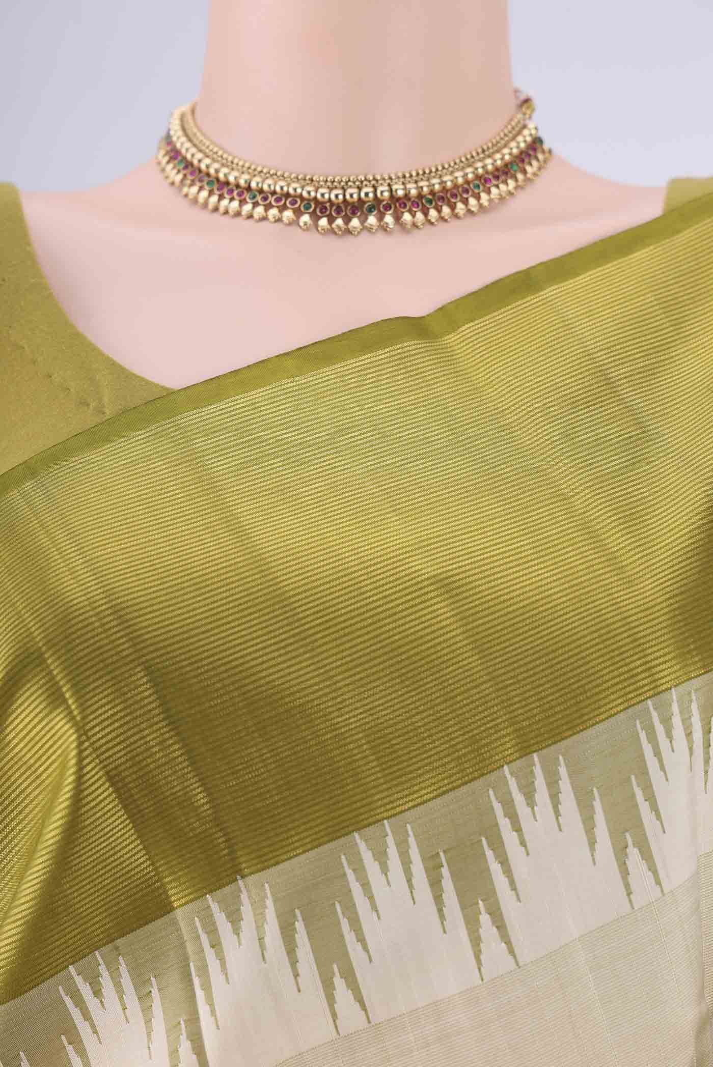 Border image of Off White Kanjivaram Silk Saree with Plain Body and Temple Border. 