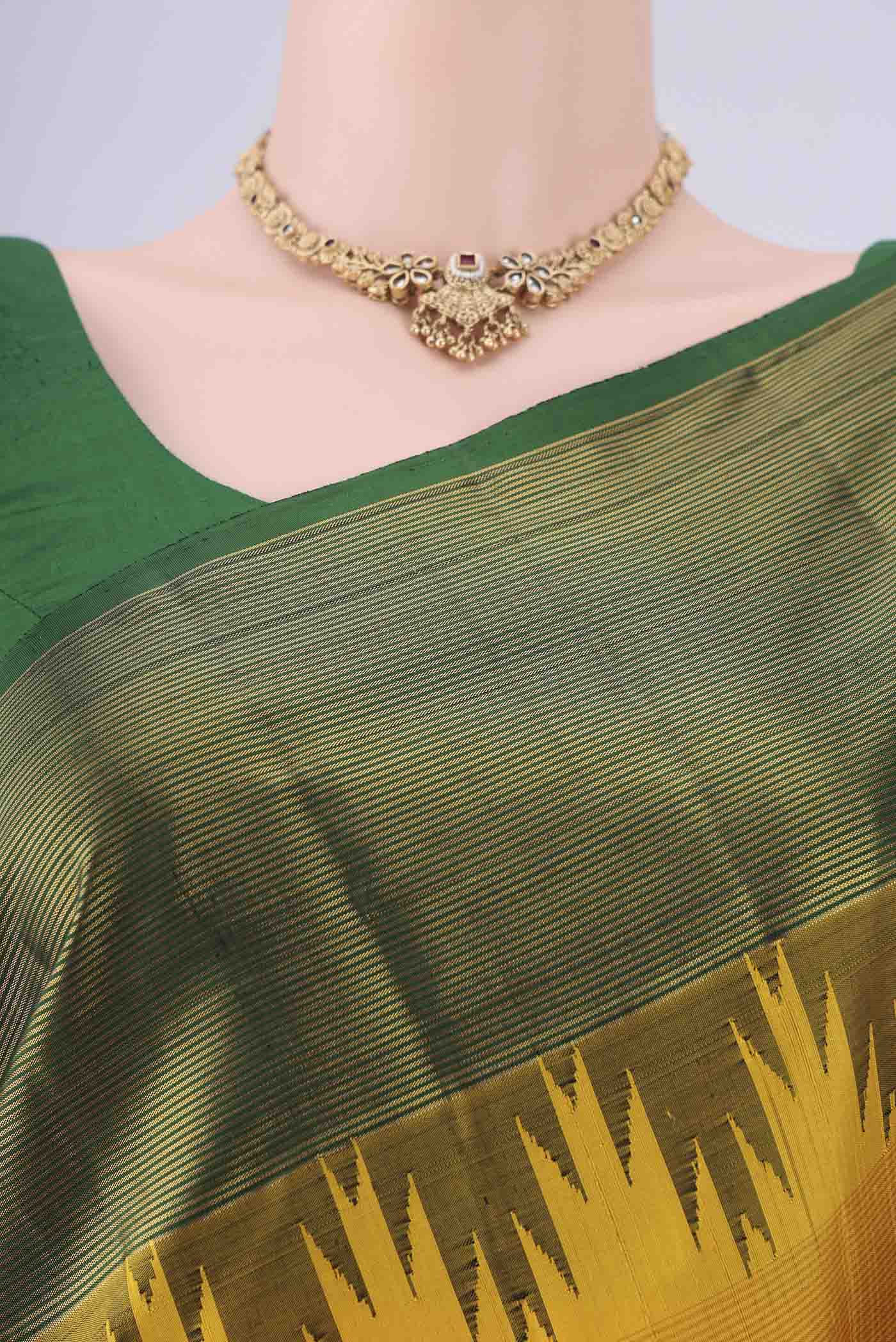 Border image of Yellow Kanjivaram Silk Saree with Plain Body and Temple Border. 