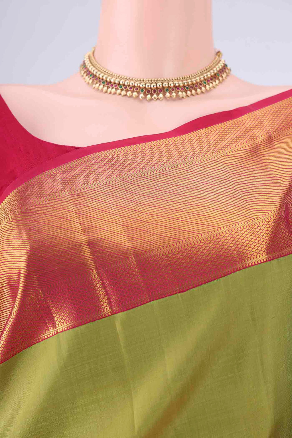 Border image of Light Green Kanjivaram Silk Saree with Plain Body and Zari Border. 