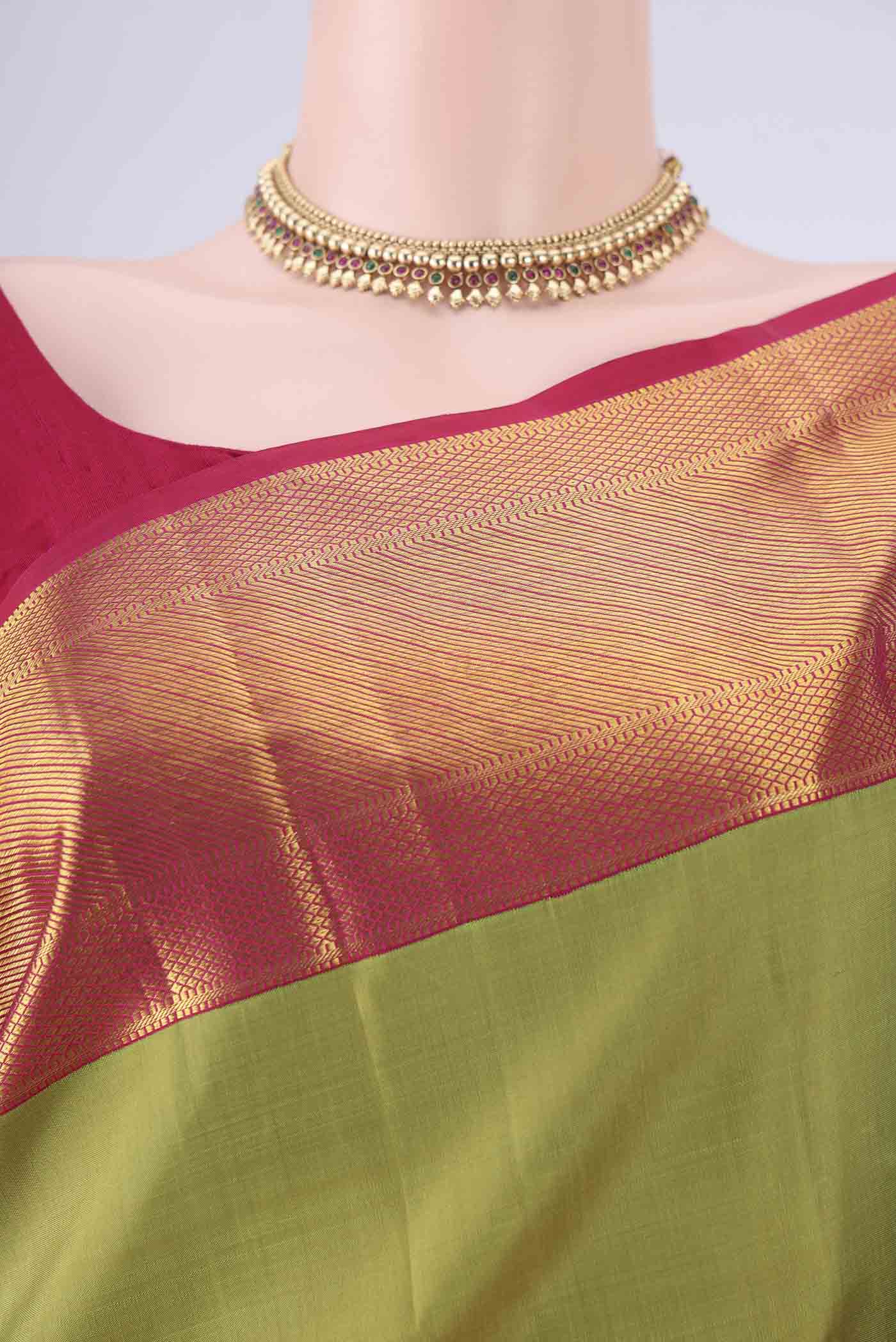 Border image of Light Green Kanjivaram Silk Saree with Plain Body and Zari Border. 