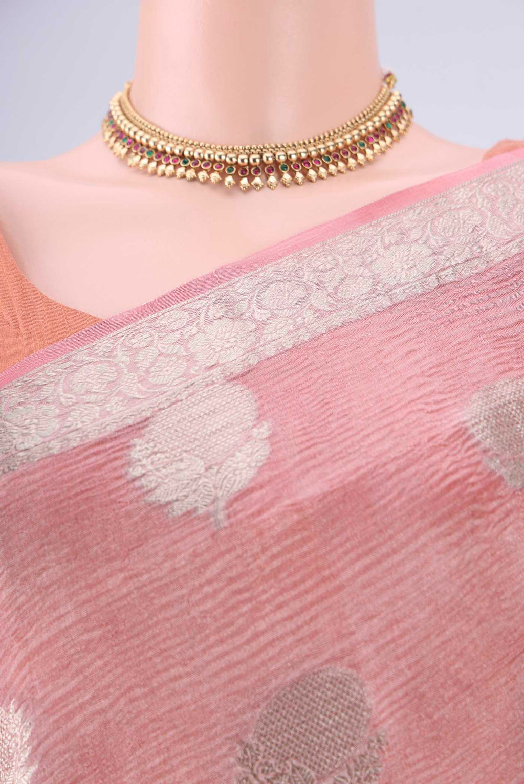Border image of Peach Dual Tone Organza Silk Saree with Half And Half on the body and Zari Border. 