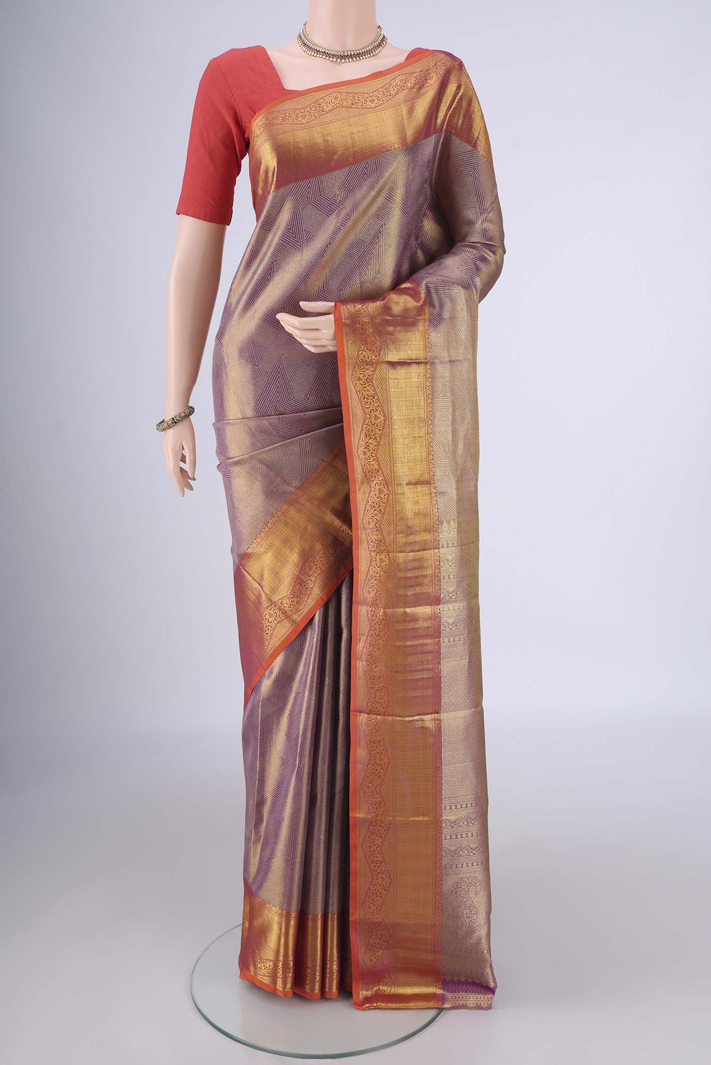 Lavender Dual Tone Kanchipuram Tissue Silk Saree with Zari Brocade on the body and Zari Border.  displayed on a mannequin