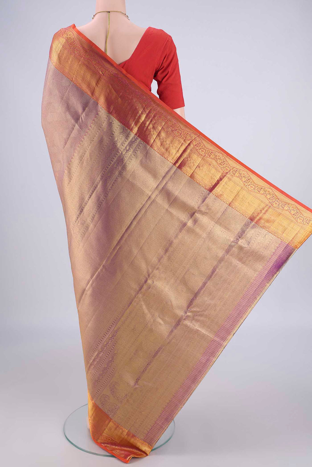 Flat view of Lavender Dual Tone Kanchipuram Tissue Silk Saree with Zari Brocade on the body and Zari Border. 