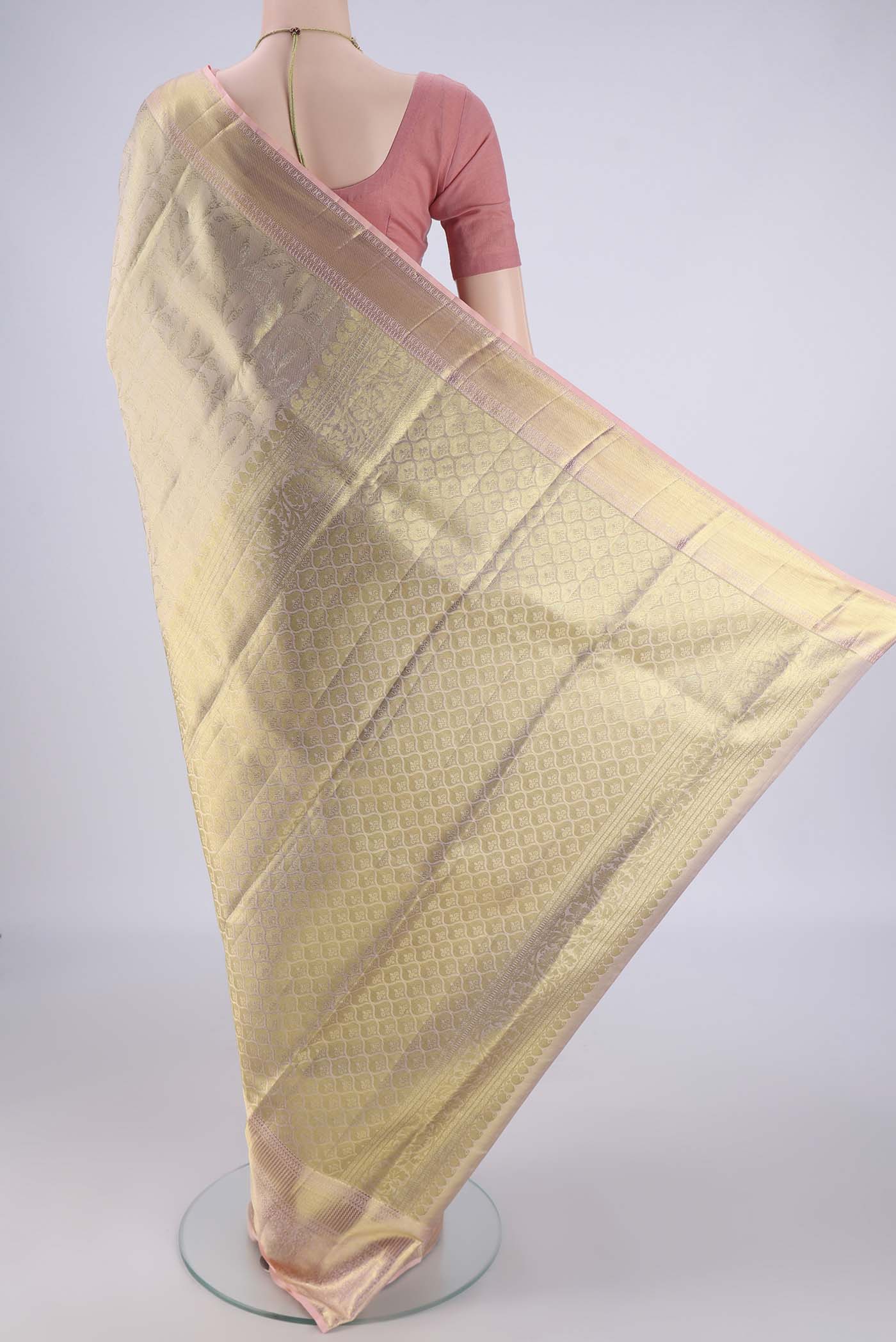 Flat view of Golden Dual Tone Kanchipuram Tissue Silk Saree with Zari Brocade on the body and Zari Border. 