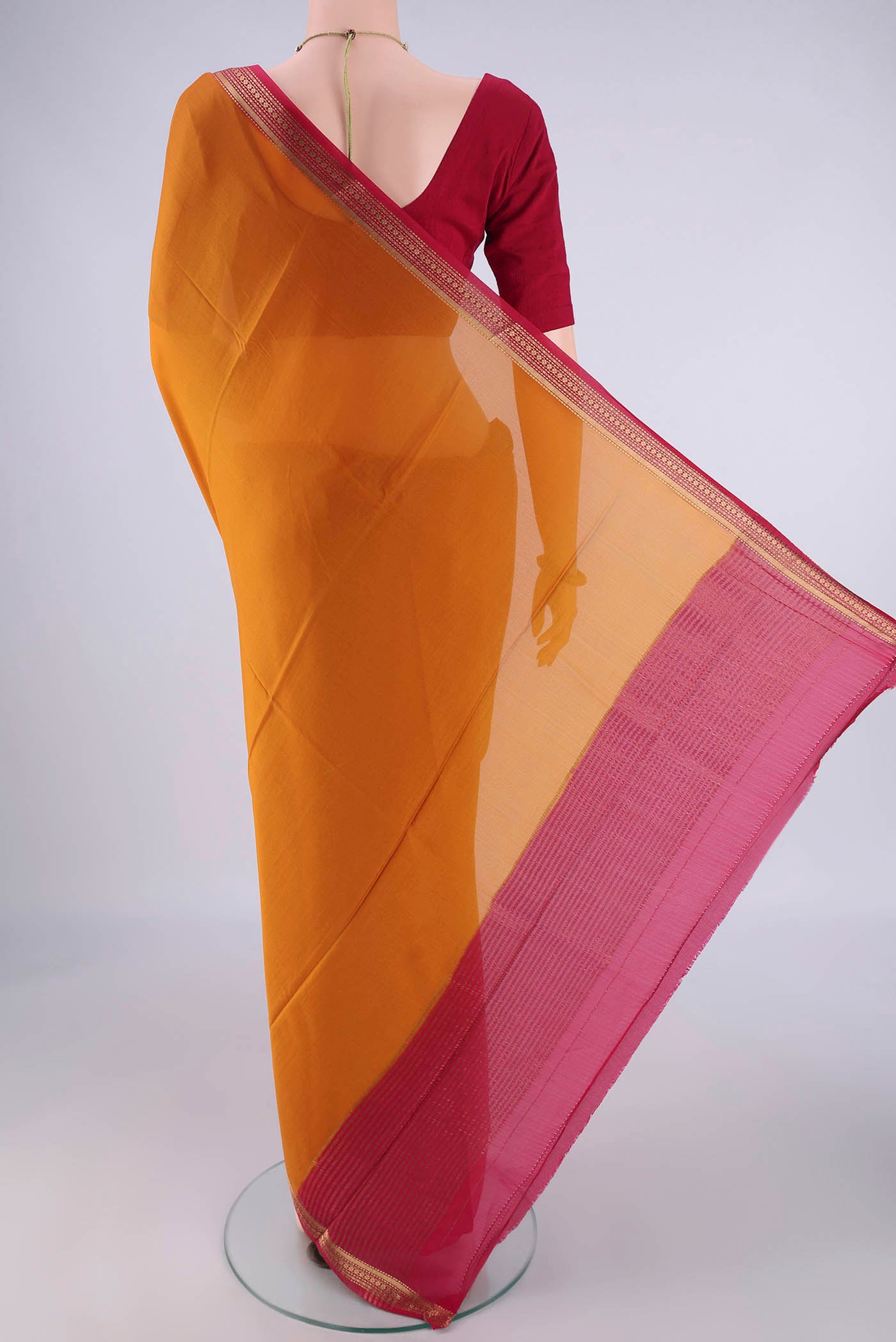Flat view of Mustard Mysore Crepe Saree with Plain Body and Zari Border. 
