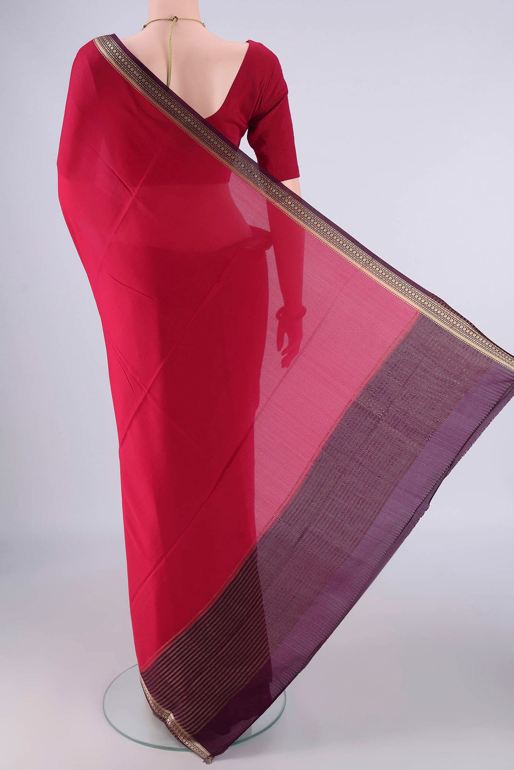 Flat view of Dark Pink Mysore Crepe Saree with Plain Body and Zari Border. 