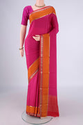 Rani Pink Mysore Crepe Saree with Plain Body and Zari Border.  displayed on a mannequin