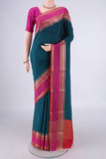Teal Mysore Crepe Saree with Plain Body and Zari Border.  displayed on a mannequin