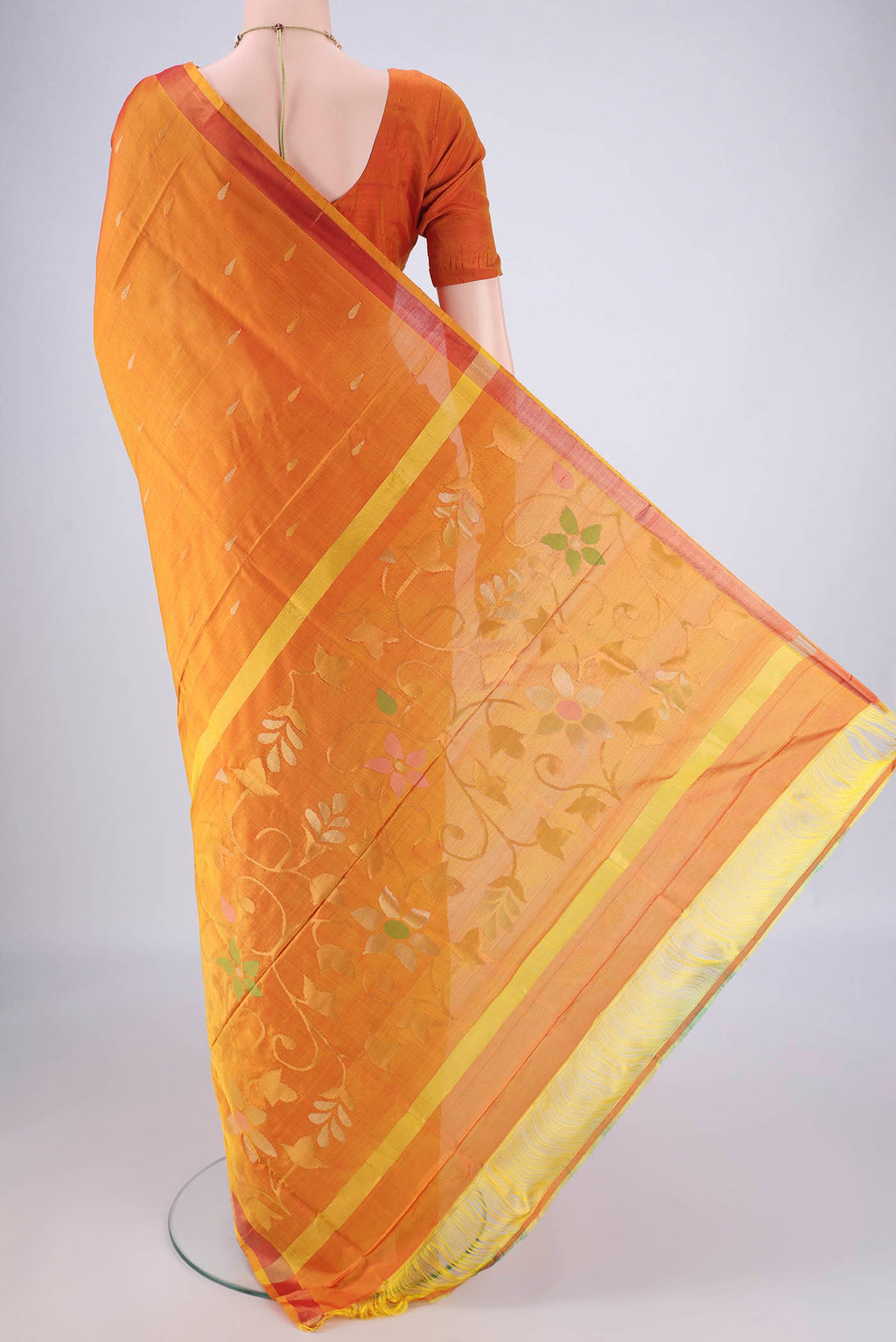 Flat view of Mustard Uppada Silk Saree with Zari Butta on the body and Zari Border. 