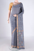 Grey Uppada Silk Saree with Zari Butta on the body and Zari Border.  displayed on a mannequin