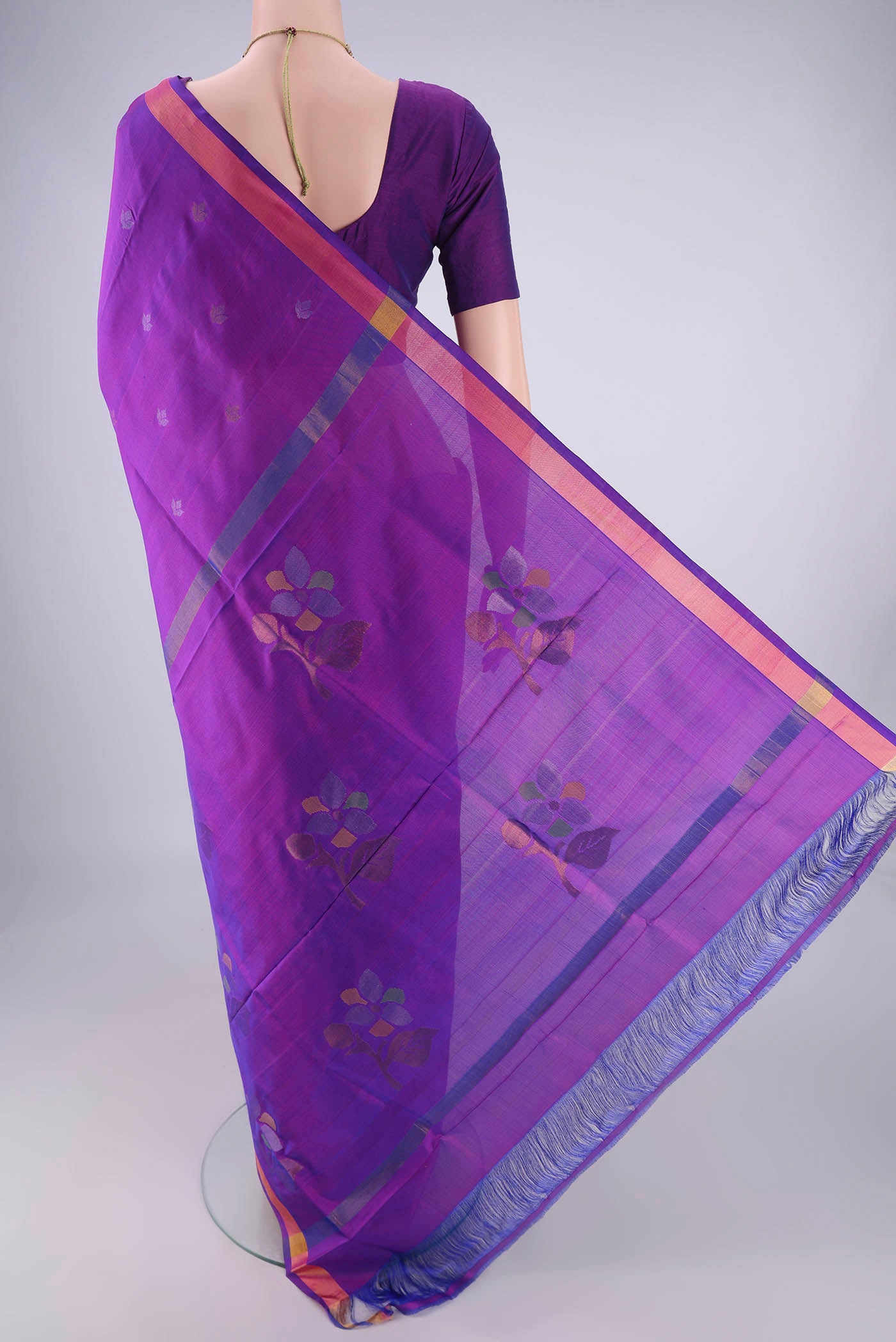 Flat view of Purple Uppada Silk Saree with Zari Butta on the body and Zari Border. 