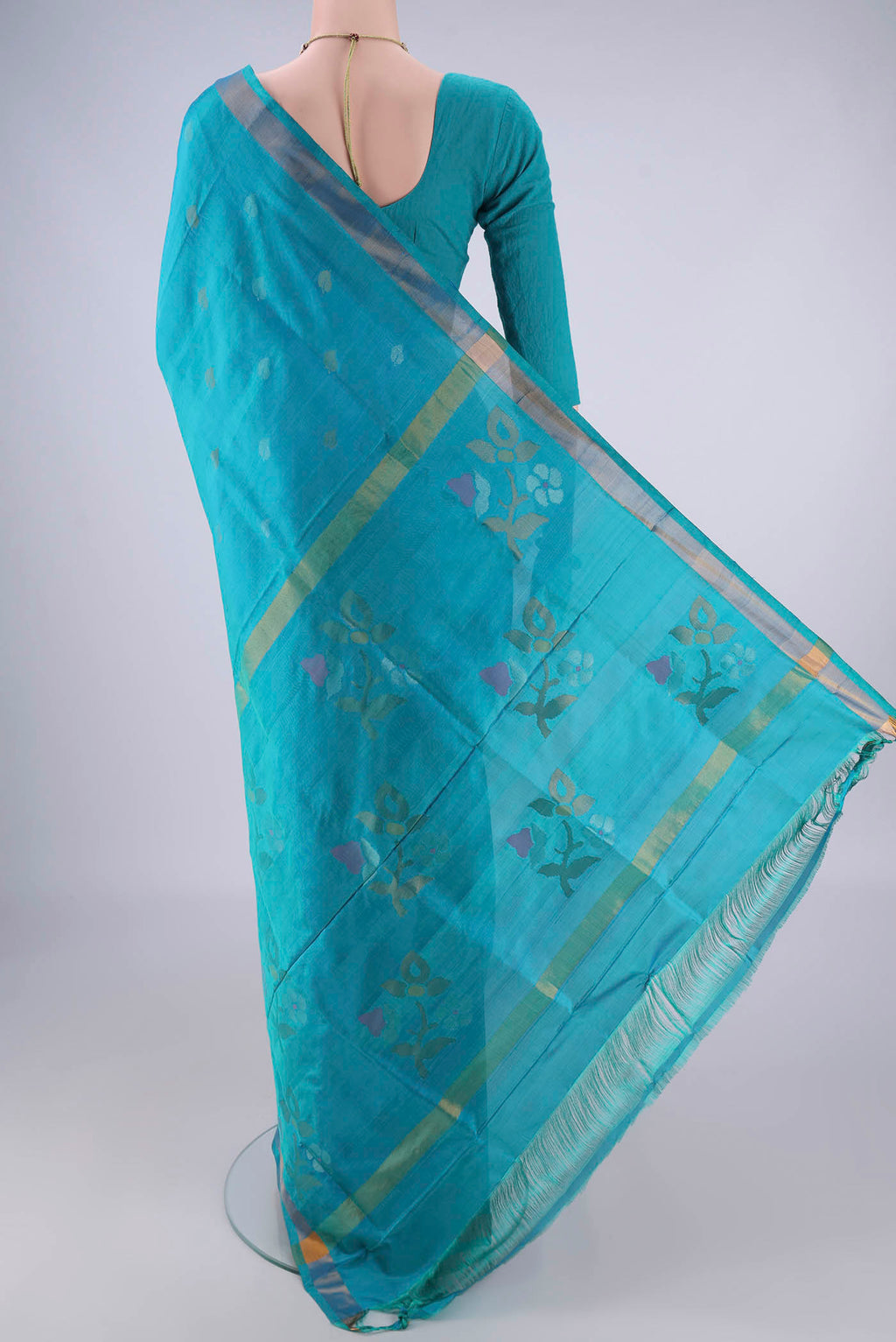 Flat view of Turquoise Uppada Silk Saree with Zari Butta on the body and Zari Border. 