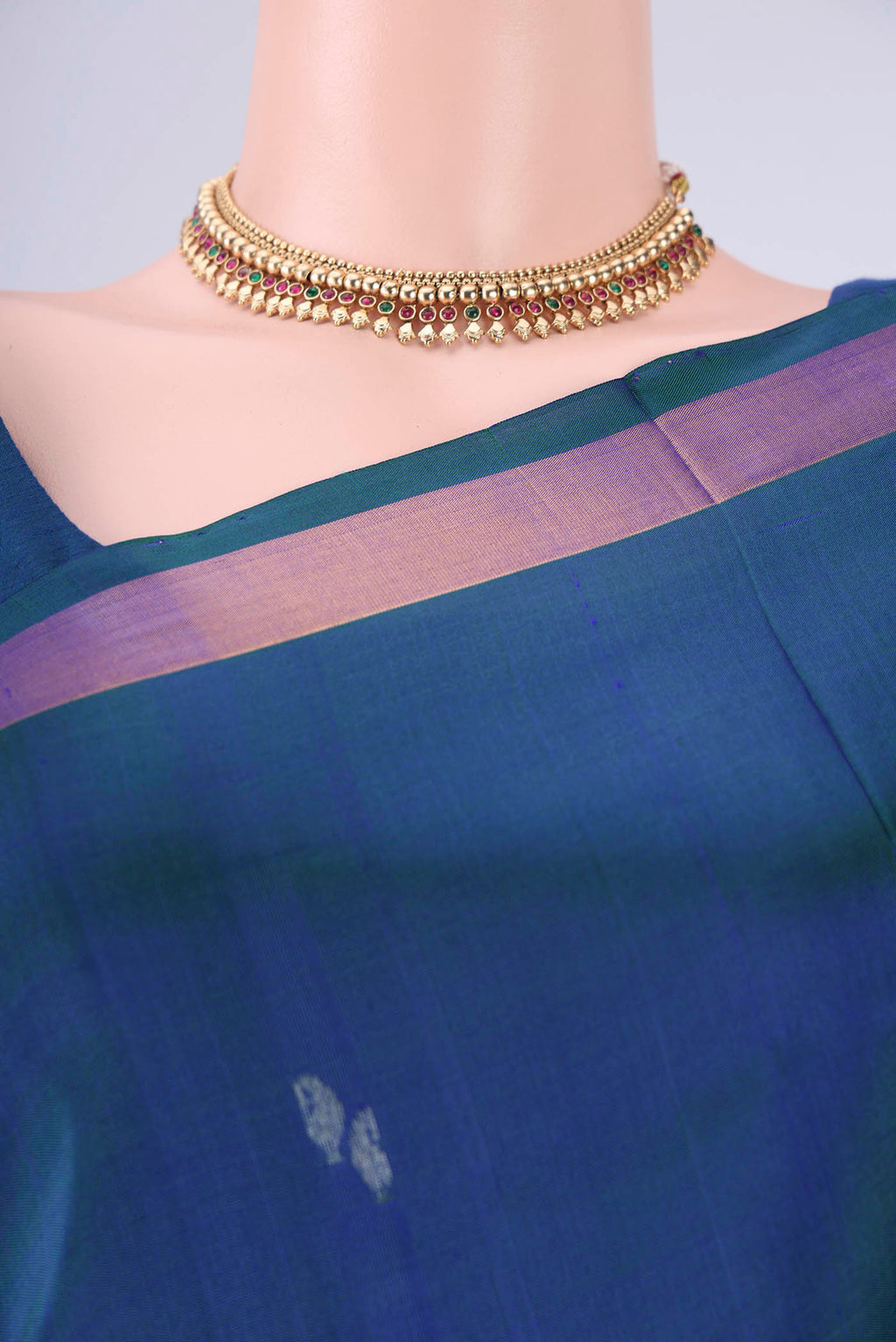 Border image of Turquoise Uppada Silk Saree with Zari Butta on the body and Zari Border. 