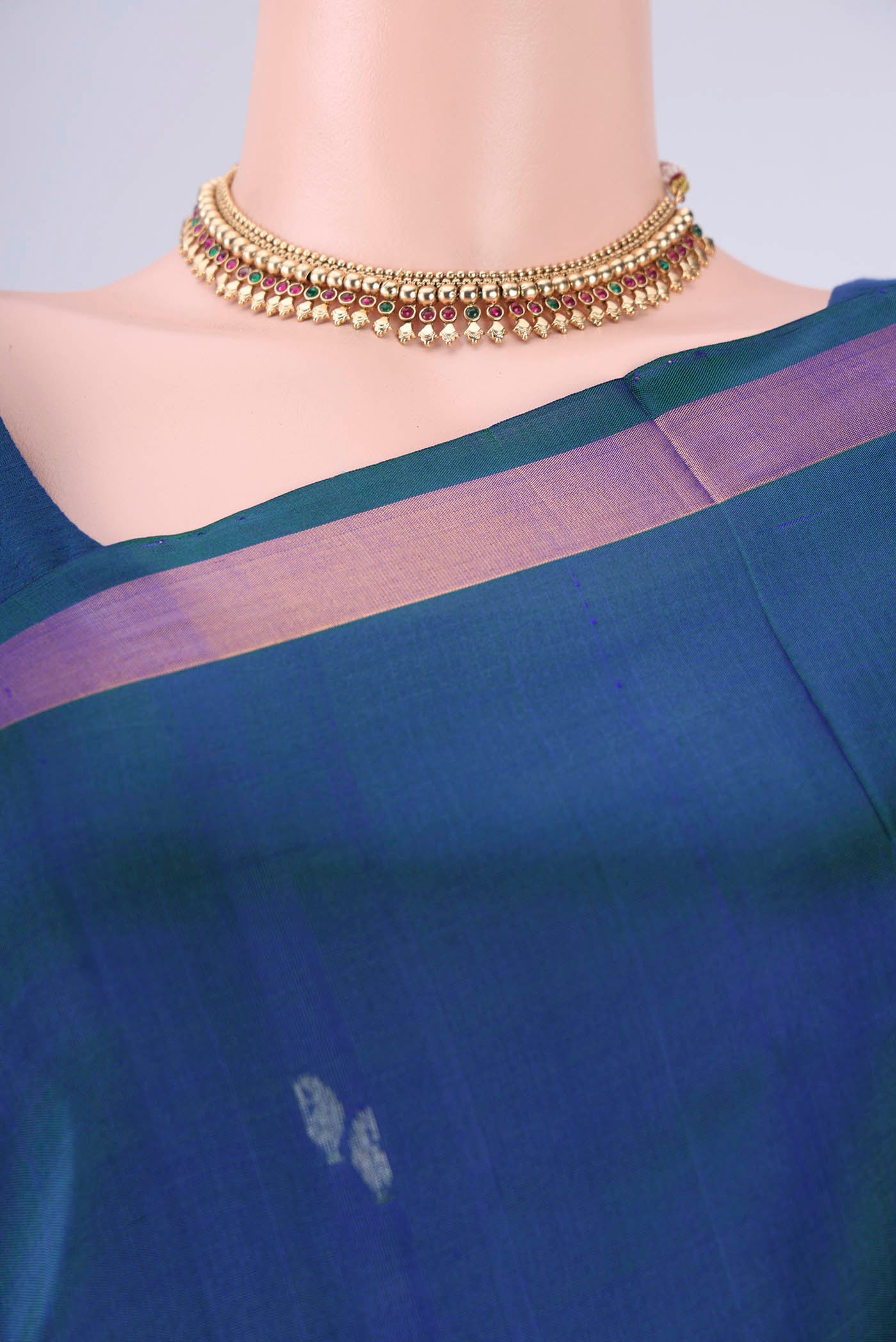 Border image of Turquoise Uppada Silk Saree with Zari Butta on the body and Zari Border. 