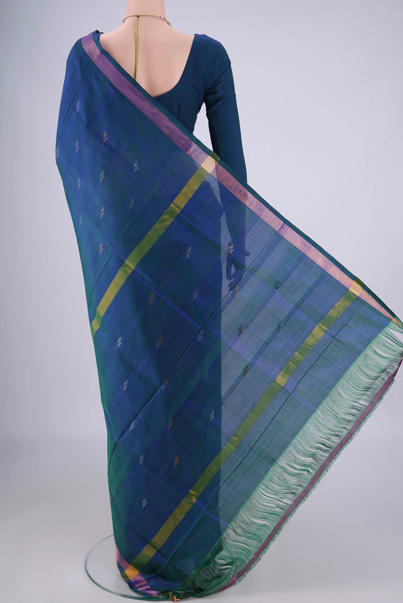 Flat view of Turquoise Uppada Silk Saree with Zari Butta on the body and Zari Border. 