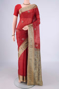 Red Banarasi Tussar Silk Saree with Embroidery on the body and Zari Border.  displayed on a mannequin