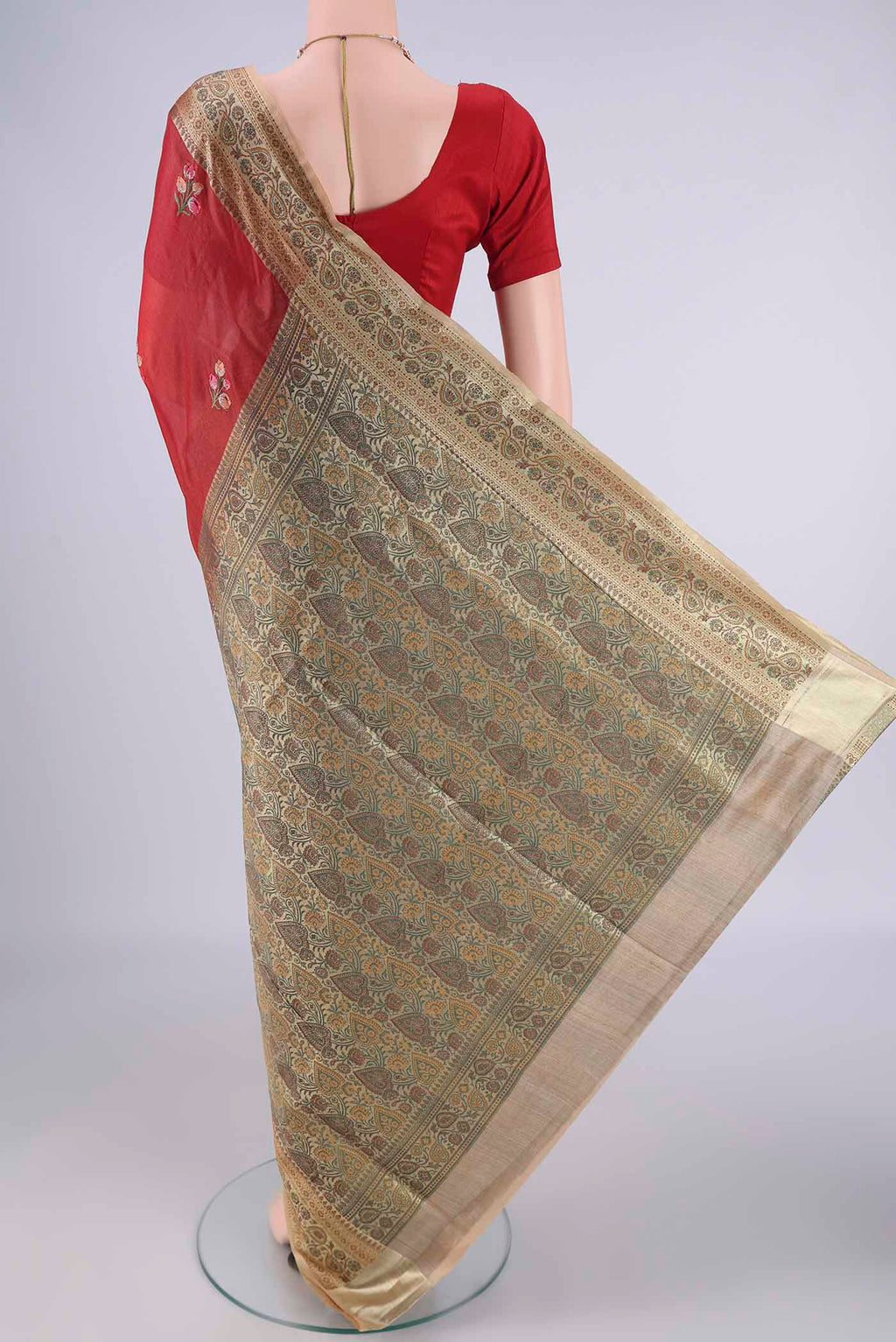 Flat view of Red Banarasi Tussar Silk Saree with Embroidery on the body and Zari Border. 