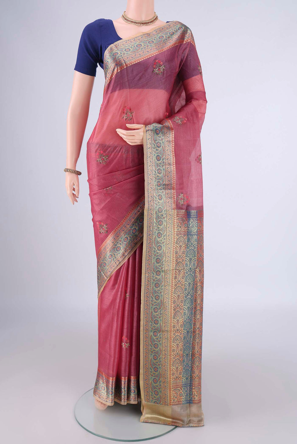 Pink Banarasi Tussar Silk Saree with Embroidery on the body and Zari Border.  displayed on a mannequin