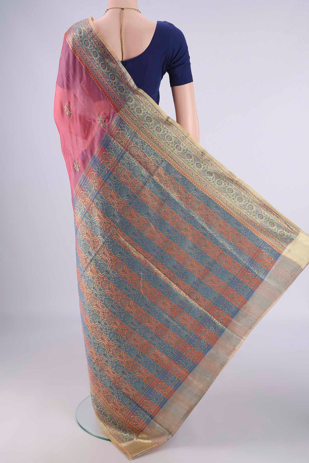 Flat view of Pink Banarasi Tussar Silk Saree with Embroidery on the body and Zari Border. 